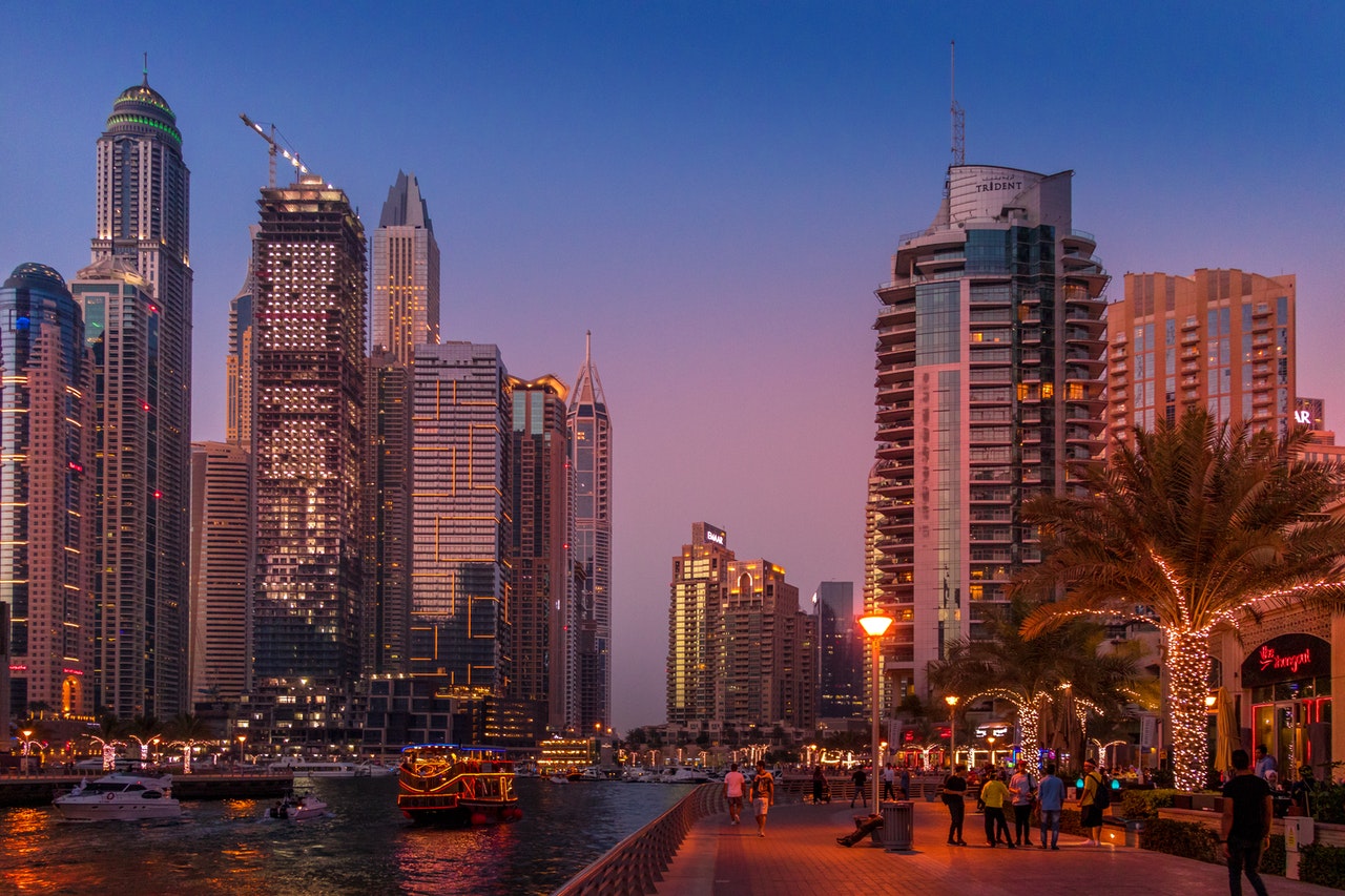 city-buildings-during-sunset-1470502_Amongst the global competitiveness table UAE ranked Ninth globally and tops the MENA region