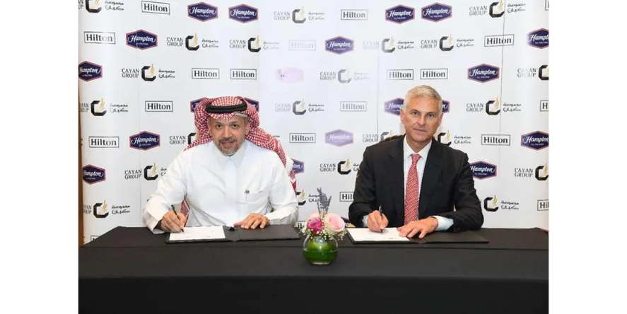 Mr. Ahmed M. Alhatti, Chairman - Cayan Group and Christopher J. Nassetta, President & CEO - Hilton Worldwide at the signing ceremony.