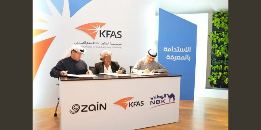 Dr. Ameenah Farhan, KFAS Director General, Mr. Sulaiman Barrak Al-Marzouq, Deputy CEO of National Bank of Kuwait - Kuwait, and Mr. Nawaf Algharabally, Acting CEO of Zain Kuwait during signing ceremony.