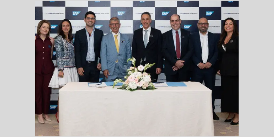 (Centre) Patrick Chalhoub, Group President of Chalhoub Group, Manos Raptopoulos, President of SAP EMEA, and Marwan Zeineddine, Managing Director, SAP UAE, were joined by executives from both organizations at the signing ceremony. Image courtesy: SAP