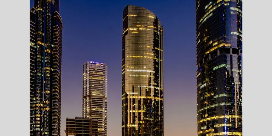 JLT - Gold Tower night. Image courtesy: DGCX