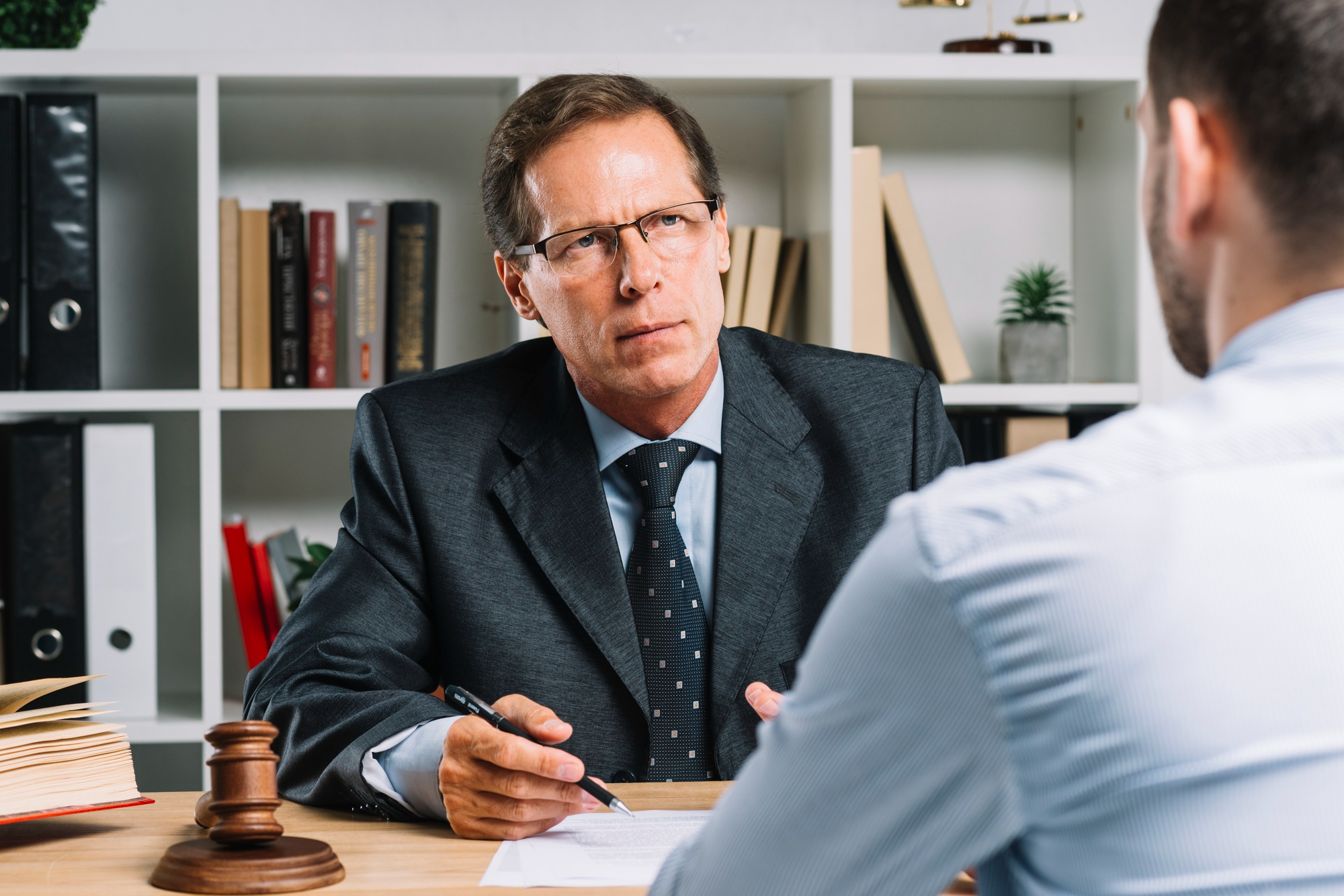 Representational Image of lawyer with his client. Image Courtesy: Freepik