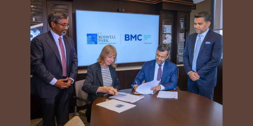 Dr. Candace S. Johnson and Dr. Mujtaba Ali Khan sign the agreement in New York in the presence of Dr. Shamsheer Vayalil and Dr. Sai Yendamuri. Image courtesy: Burjeel Medical City